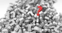 Pile of grey question marks with a red question mark on top Pile of grey question marks with a red question mark on top